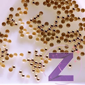 Kép 1/2 - Mini szegecs pezsgő színben