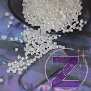 Kép 1/2 - félgyöngy körömdísz 1.5mm átmérőjű hófehér színben