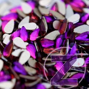 Kép 3/3 - csepp alakú formakő purple flame színben