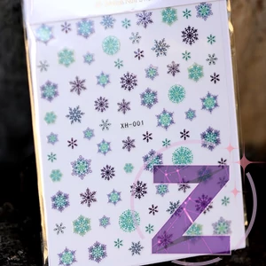 Kép 2/2 - karácsonyi körömmatrica színes hópelyhek