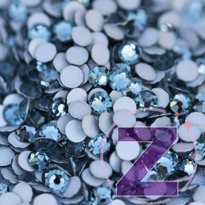 Kép 2/4 - preciosa strasszkő ss5 méretben smoked sapphire színben
