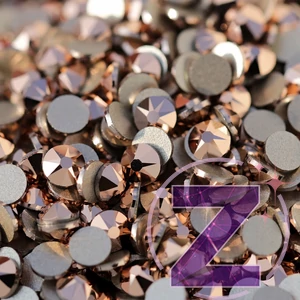 Kép 1/2 - swarovski strasszkő ss12 méretben rose gold színben