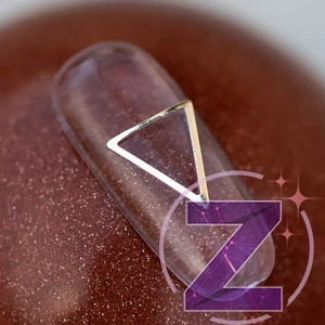 Kép 2/2 - zodiac szegecs körömdísz rose gold háromszög
