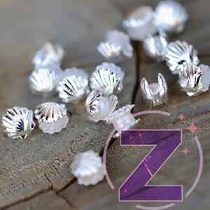 Kép 1/4 - zodiac körömdekoráció ezüst kagyló gyönggyel