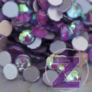 Kép 2/2 - zodiac strasszkő ss20 méretben glossy grape színben