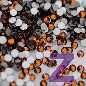 Kép 1/2 - zodiac strasszkő ss3 méretben mocca színben