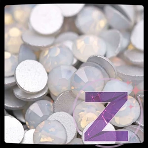 Kép 2/2 - zodiac strasszkő ss3 méretben white opal színben