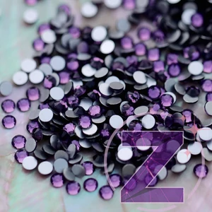 Kép 1/2 - zodiac strasszők ss5 méretben tanzanite színben
