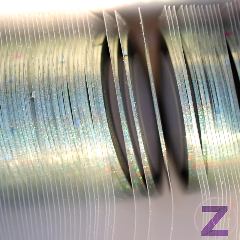körömdíszítő szalag 1mm silver ab
