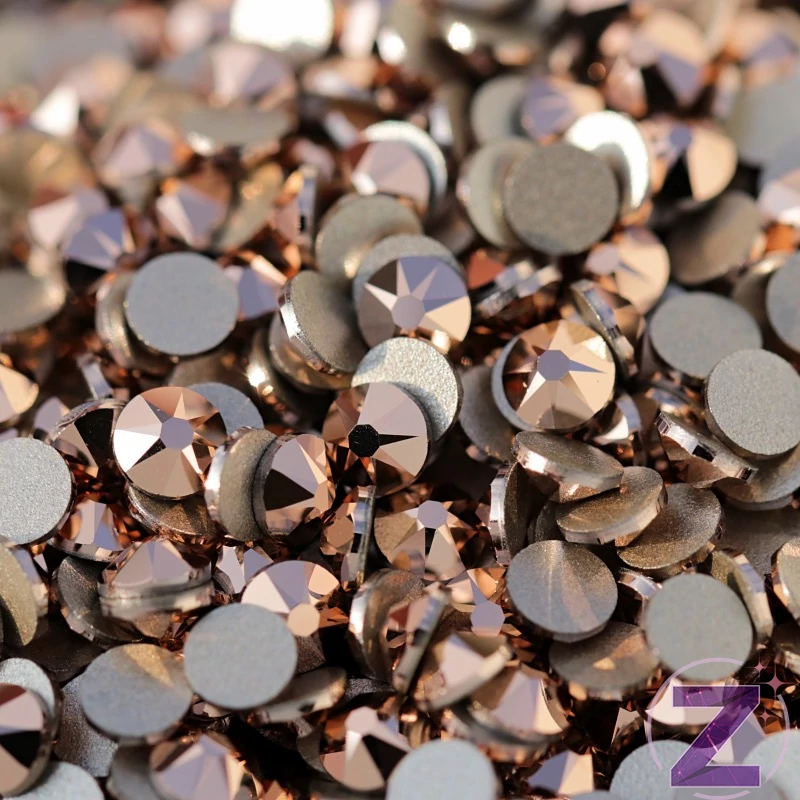 swarovski strasszkő ss12 méretben rose gold színben