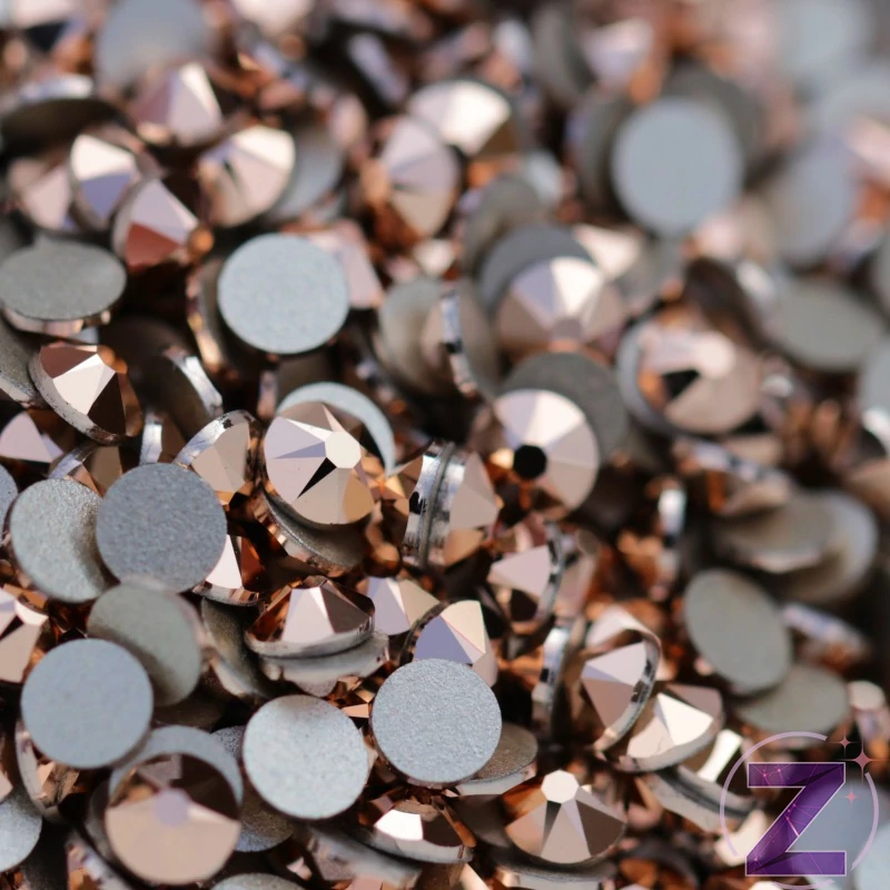 swarovski strasszkő ss12 méretben rose gold színben
