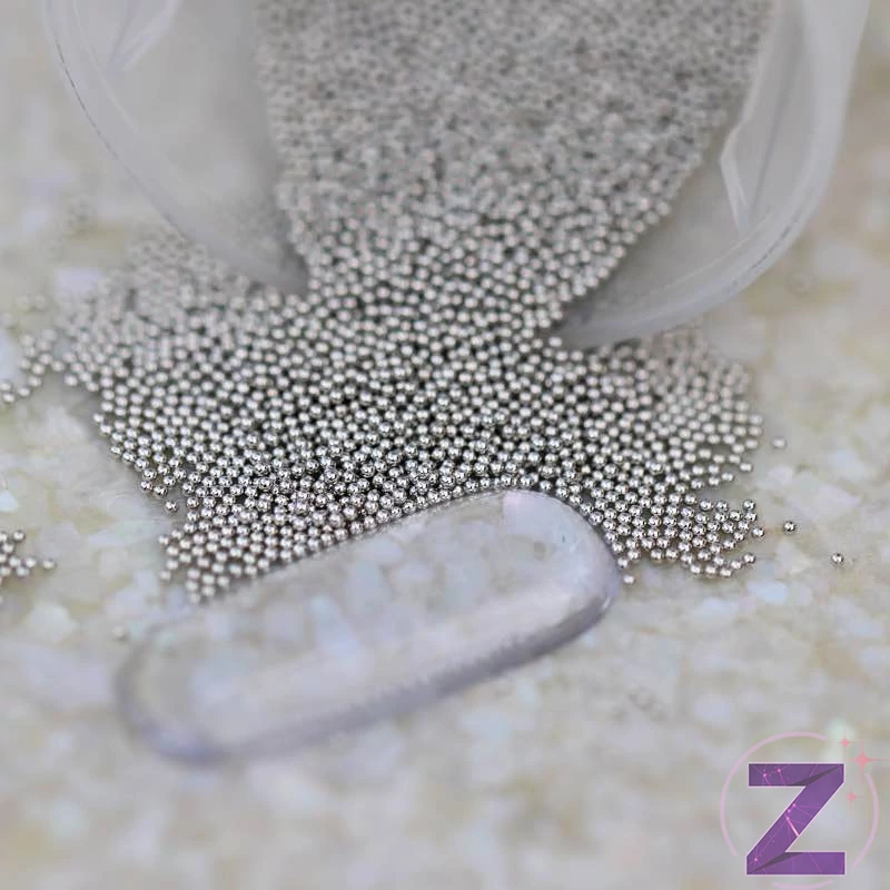 fém szórógyöngy világosszürke színben 0.6mm átmérővel