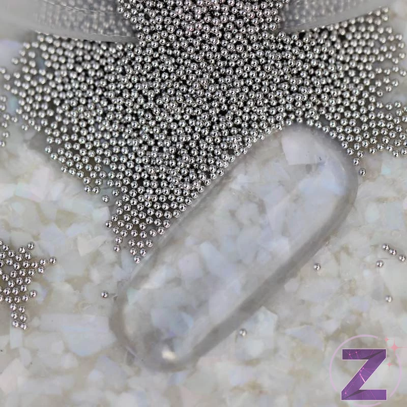 fém szórógyöngy világosszürke színben 0.6mm átmérővel