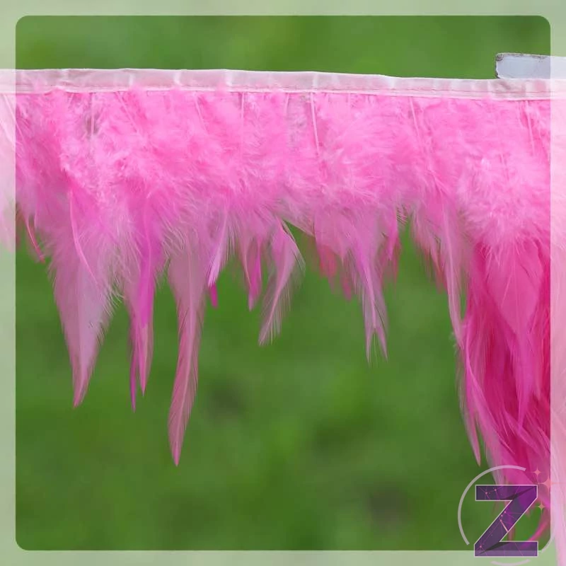 toll ruhadekoráció pink nagy tollakkal