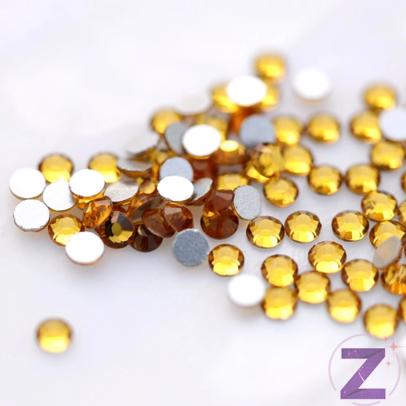 zodiac strasszkő ss8 méetben topaz színben