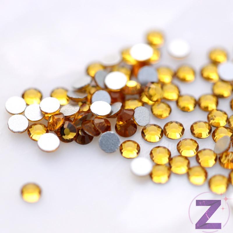 zodiac strasszkő ss3 méretben topaz színben